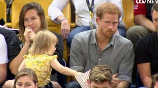 Watch This 2-Year-Old Girl Adorably Steal Popcorn From Prince Harry