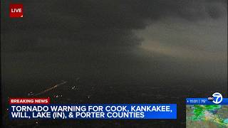 Strong storm darkens city amid tornado warnings in Chicago