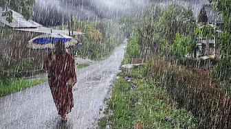 WALKING IN THE RAIN ON THE OUTSKIRTS OF AN INDONESIAN VILLAGE