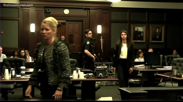 Medical Examiner overcome with emotion while testi...