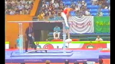 front uprise straddle cut on p bars