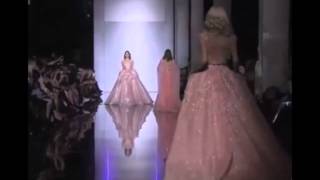 Model Giulia Manini falls down during Zuhair Murad Spring/Summer 2015 Haute Couture fashion show