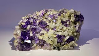 Fine Mineral Specimen: Phantom Fluorite on Quartz with Pyrite from China