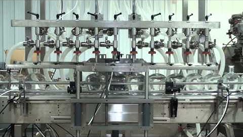 Overflow Filler Machine | Liquid Filling Machines