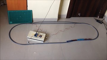 Arduino controlled model train layout with automated passing siding