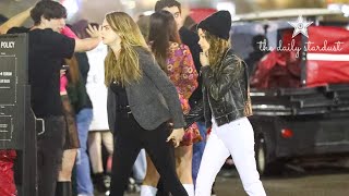 Cara Delevigne & Girlfriend Minke Hold Hands While Attending Harry Styles Concert