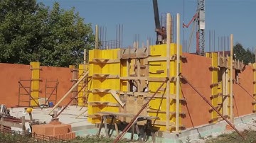 What is the best time to remove a concrete slab formwork?