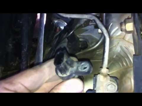 Video: Nasaan ang crank sensor sa isang 2006 Nissan Pathfinder?