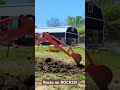 Digging a new tomato bed with a backhoe