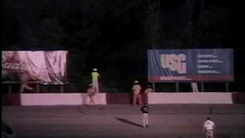 race car goes over the wall at racetrack