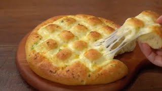 How to make cheese garlic bread:: The bread is fluffy and chewy.The sauce is straight ::