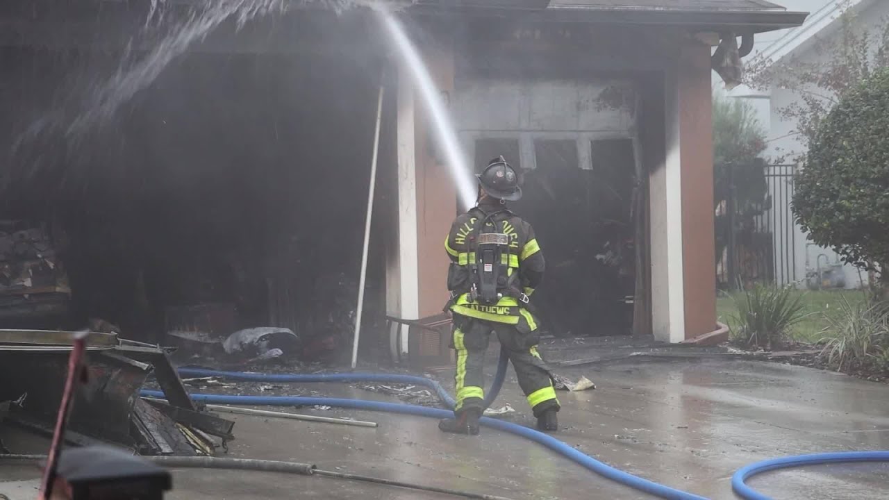 Crews battle large fire at two-story home in FishHawk - YouTube
