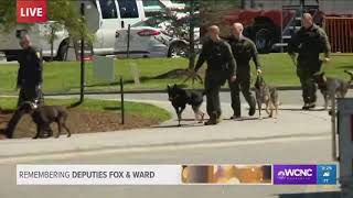 Dogs arrive at funeral for fallen K-9 deputy