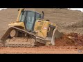 CAT D6N LGP Dozer Smoothing Out a Crest