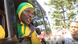 NI KELELE MAPOKEZI YA YANGA ARUSHA MJINI MASHABIKI WAWAFUATA WACHEZAJI AIR PORT.