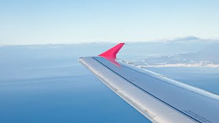 Lauda A320 9H-LOI windy but sunny landing in Malaga