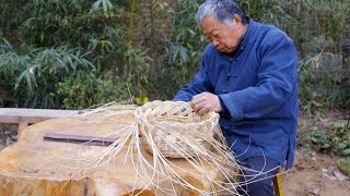 Weaving fruit baskets from young strips cut from willow trees, an ancient weaving technique