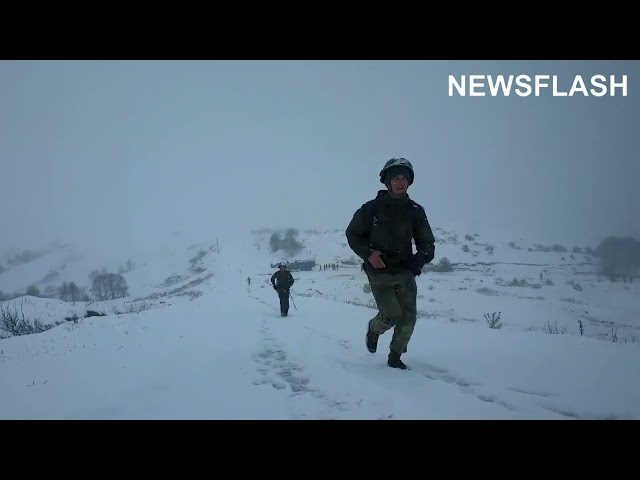 Russian Troops Make High-Speed Climb To Top Of Russian Caucasus Mountain