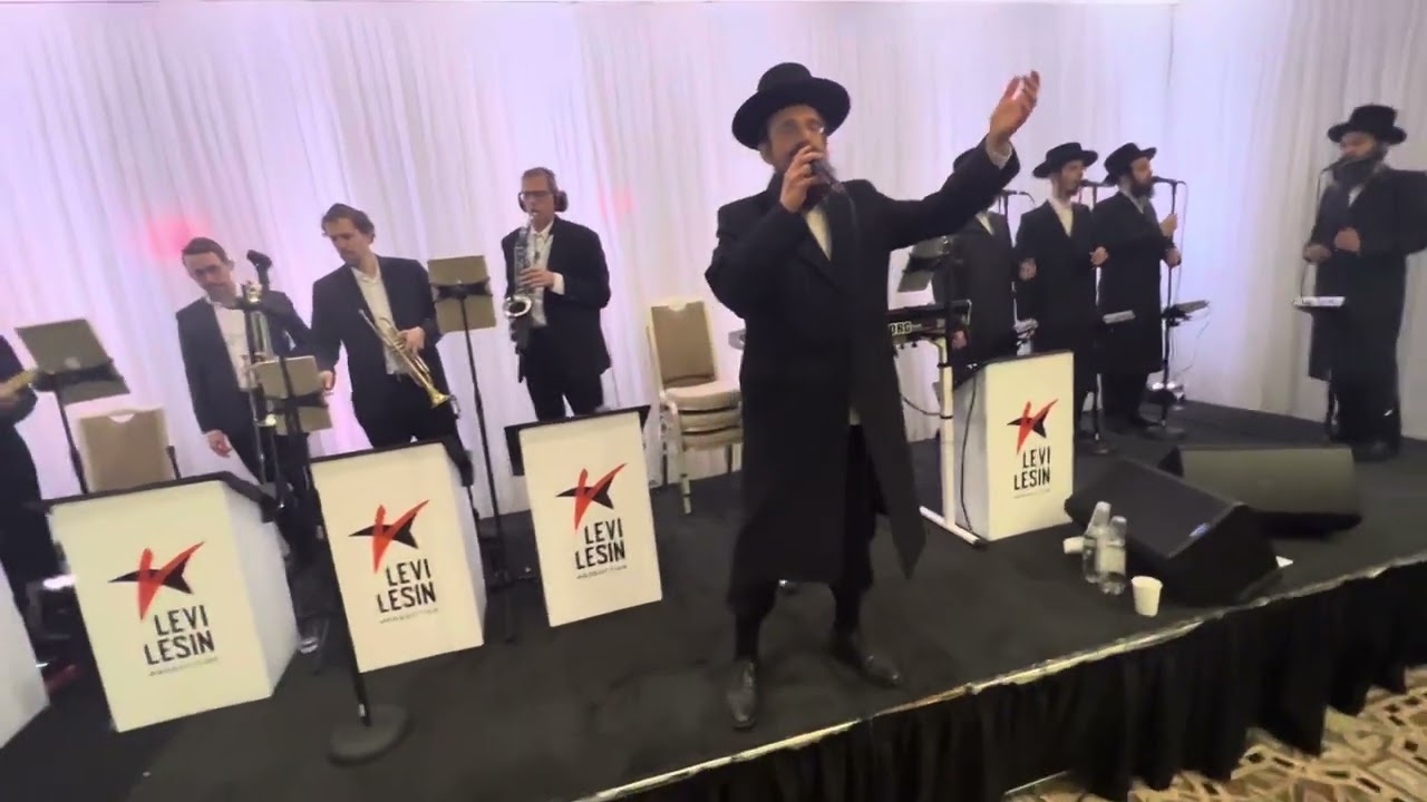 Levi Lesin on keys & Yisroel Werdyger second dance
