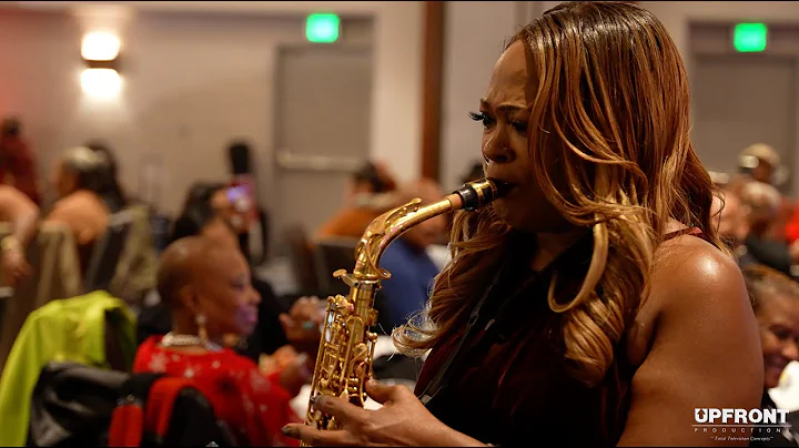 Saxophonist Jeanette Harris playing for an SRO Cro...