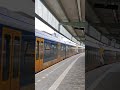 7 bakken SNG vertrekken met Tyfoon uit station Amsterdam Muiderpoort