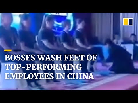 Bosses wash feet of top-performing employees in China