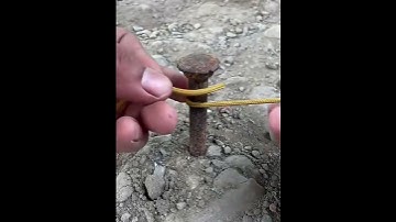 the process of tying a rope to a nail #shortsvideo