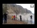 Dramatic amateur video Huge cliff crumbles into sea in Hastings