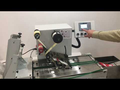 Automatic labelling of plastic card holders with LAB510