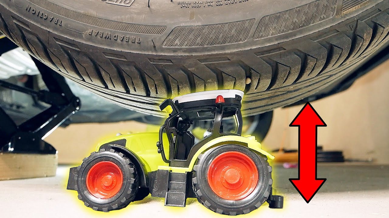 Car press Crushing the tractor with a heavy car And Play Doh Garage