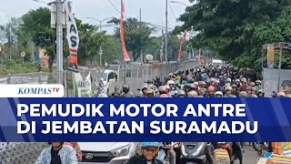 The Suramadu Bridge is crowded with motorcyclists during Eid homecoming, prompting police to impl...