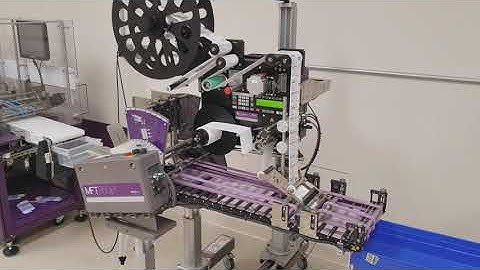 MFT Friction Feeder and IMPRESSO Labeler System | Feeding and Labeling Plastic Bags