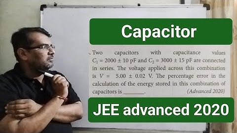 Two capacitor with capacitance values C1=2000+-10pF andC2=3000+-15pF are connected in series