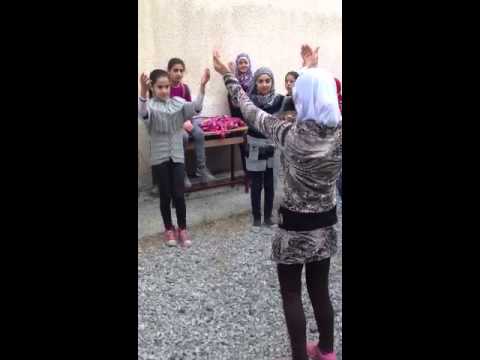 Syrian Refugee Girls doing dance at school in Iskenderun, Turkey