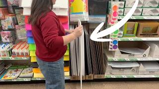 She buys a GIANT Dollar Store poster board for this genius living room idea!