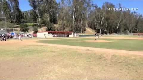 La Serna's Curtis Ashton is thrown out at first ba...