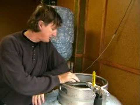 Brewing a vienna lager at home, all grain. One of the few remaining commercial examples of this style of beer is Dos Equis Amber, which my beer tries to emulate. Preparing the grist and adding the grist to the mash water or doughing in. Here we measure out the ingredients of the grist, mill it and then dough it in. Do not forget to visit: rims-brewing.tripod.com http