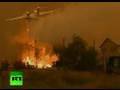Video of firefighters battling wildfires across Russia