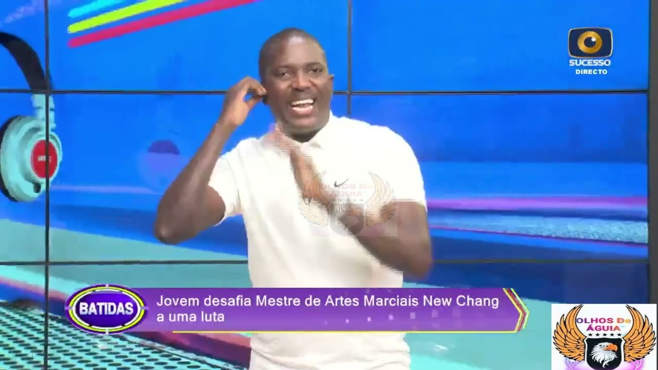 New Chang se esconde de Van Dame.