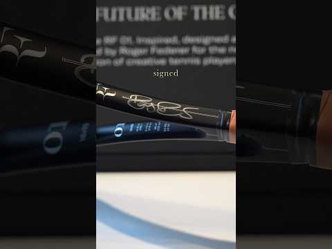 Signed Federer racket