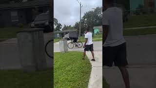 Biker Slams a Car While He Carries a Couch