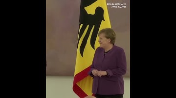 Thumbnail of Merkel decorated with highest German honor amid reflection on tenure