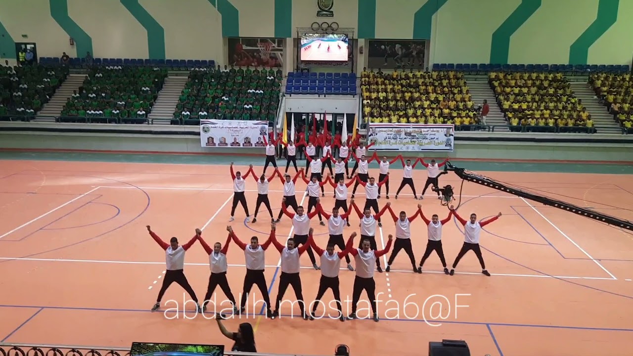عرض طلبه تربيه الرياضيه جنوب الوادي بقنا في افتتاح البطوله العربيه لخماسيات كره القدم