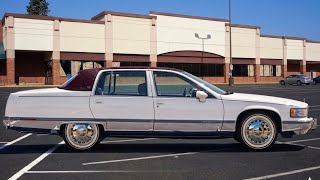 1994 Cadillac Fleetwood Brougham on Factory Chrome Wheels and Vogue Tires 