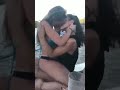 lesbian girl kissing romantic in public.