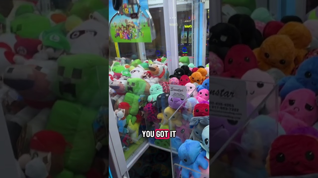 Winning a flippy octopus on a #clawmachine at a casino