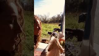 Woman Sings as One Dog Howls and Another Joins In