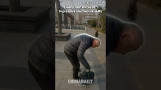 Elderly man shows off impressive shuttlecock skills