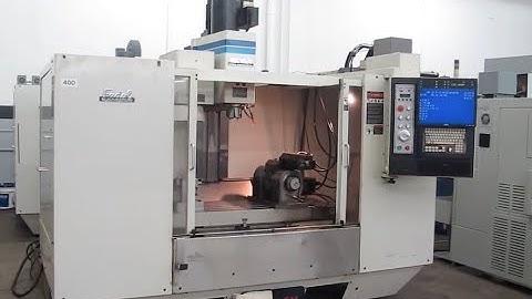 CNC Vertical Machining Center 5 Axis Trunion Table.