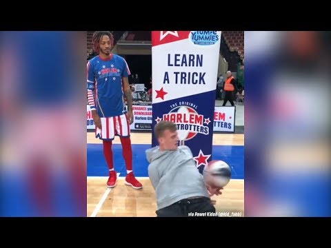 Harlem Globetrotter gets SCHOOLED by a basketball freestyler!